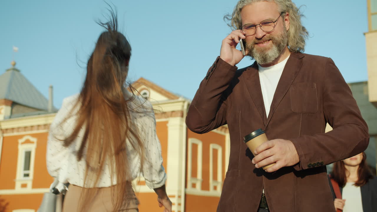 Business People Talking on a City Street