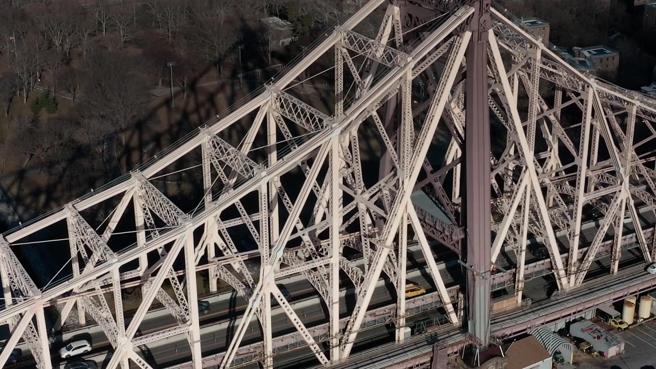 View of the Queensboro Bridge in New York with traffic on the road below