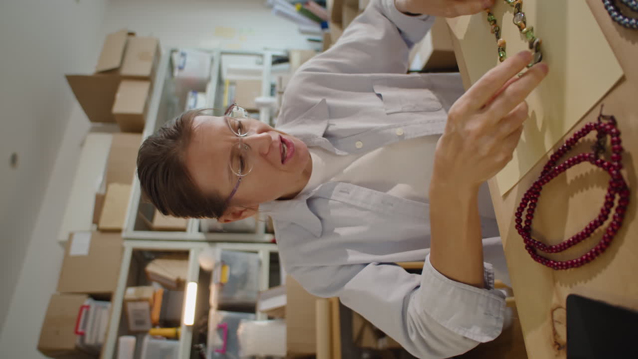 Female Blogger Telling about Handmade Jewelry on Camera