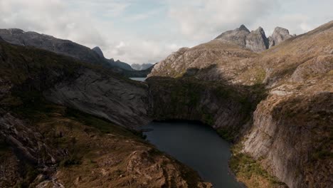 Aerial-view-of-Segla-mountain-above-the-sky,-Norway-during-summer