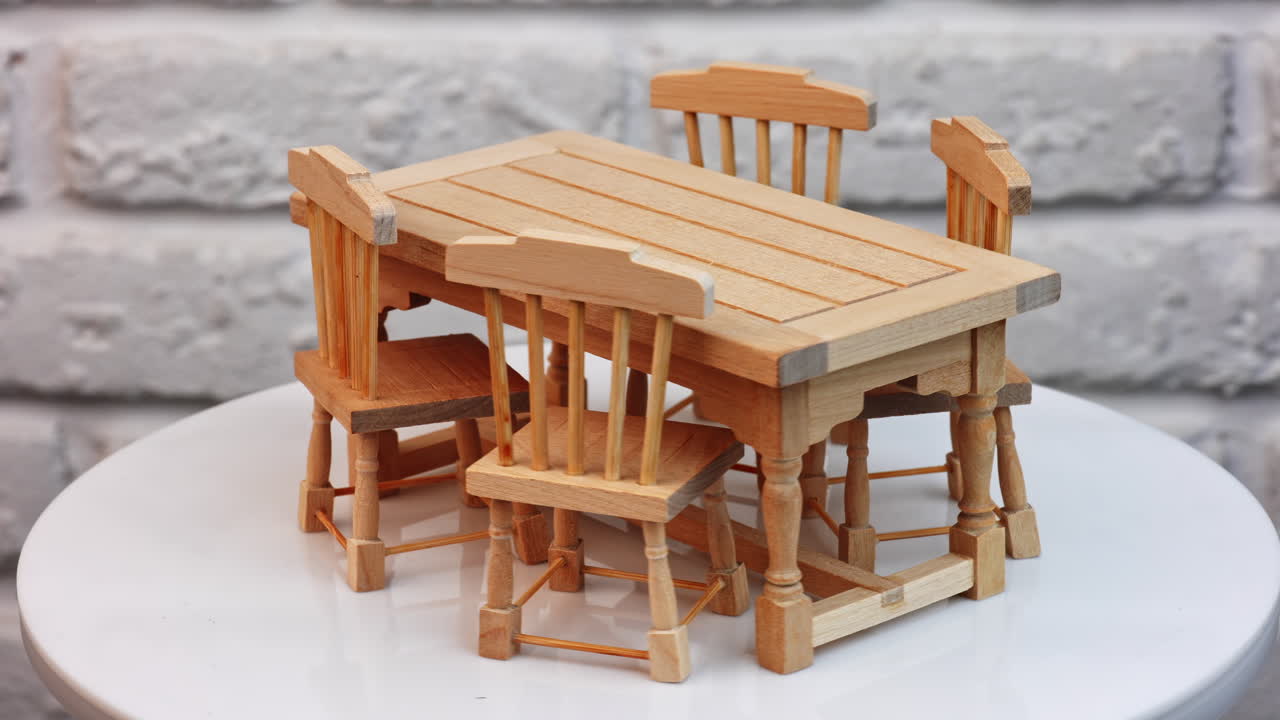 Smal table with chairs for toys. Tiny childs furniture decoration.