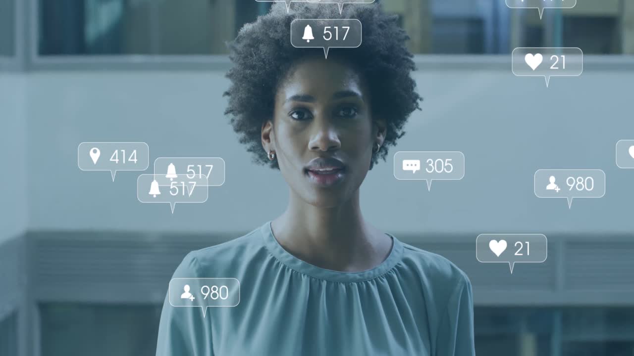 Animation of social media icons and data processing over biracial businesswoman