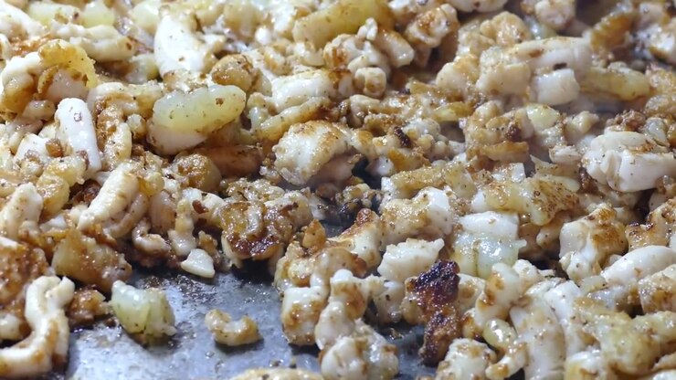 Asian Vendor Cook Fried Squid Egg at Street Food Stall