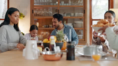 Praying,-talking-and-family-eating-breakfast