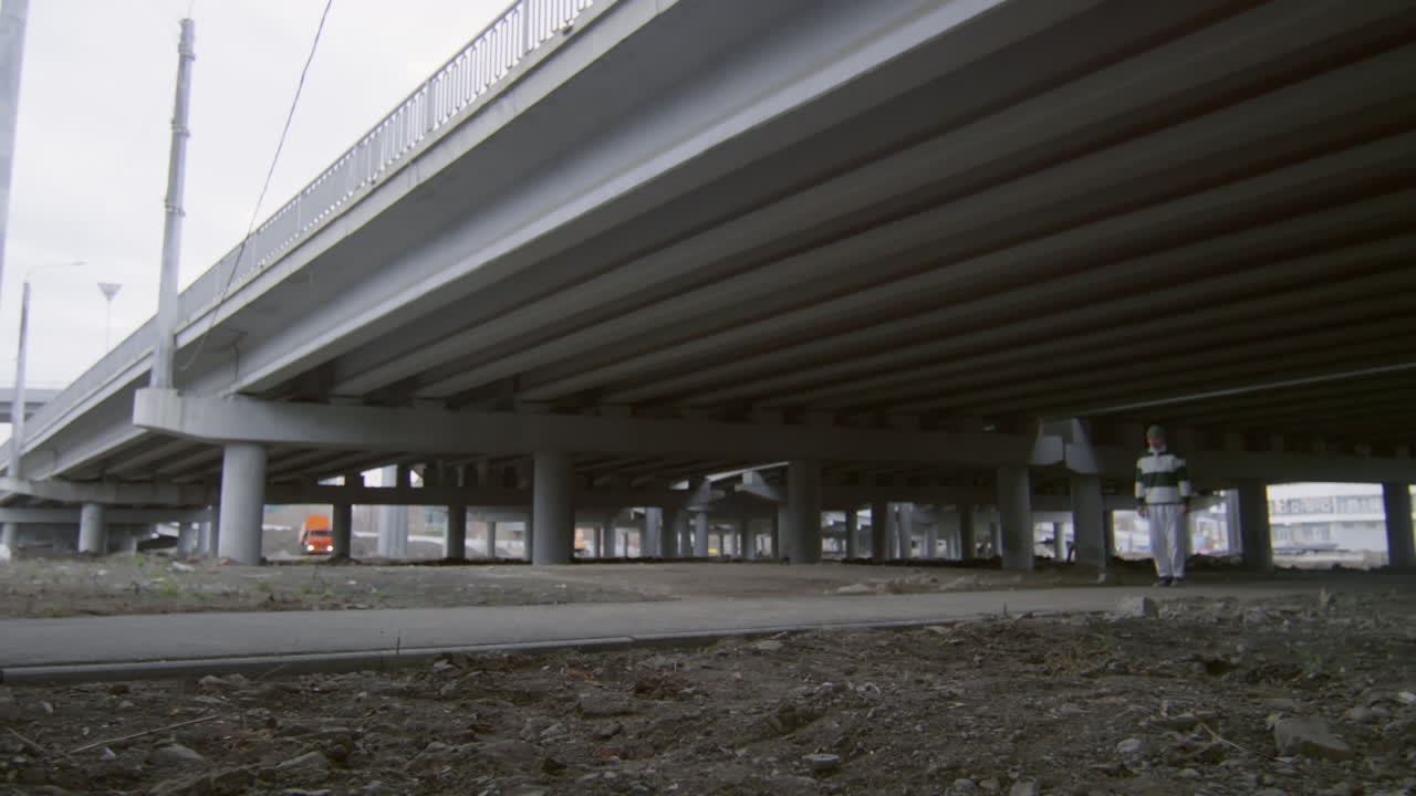Two Parkourists Performing Cartwheel and Backflips