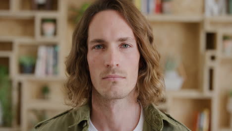 close up portrait of young man looking confident with long hair real people series