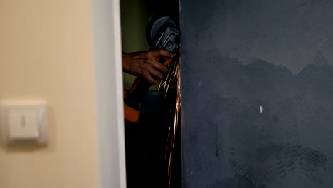 angle grinder. flying sparks from the work angle grinders