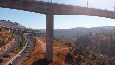 highway overpass and bridge in a mountainous landscape