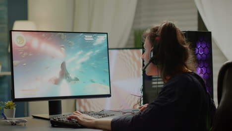 player sitting on gaming chair playing online space shooter video games