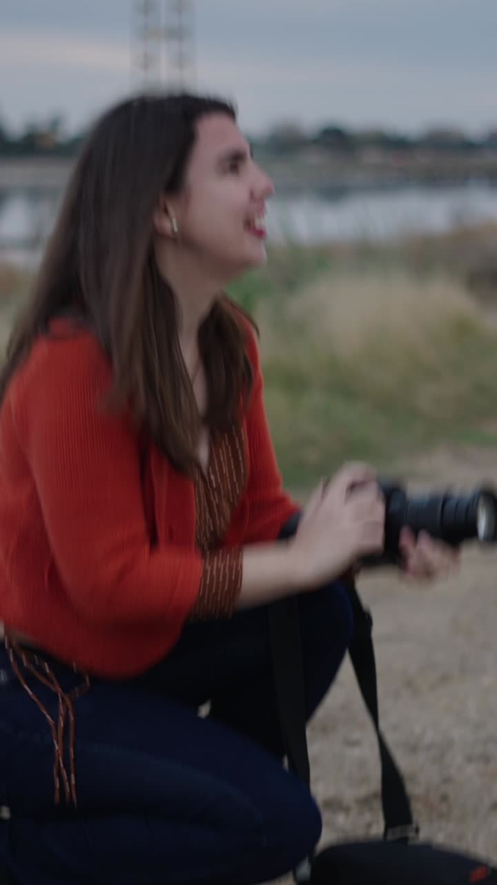 A woman taking pictures with a camera