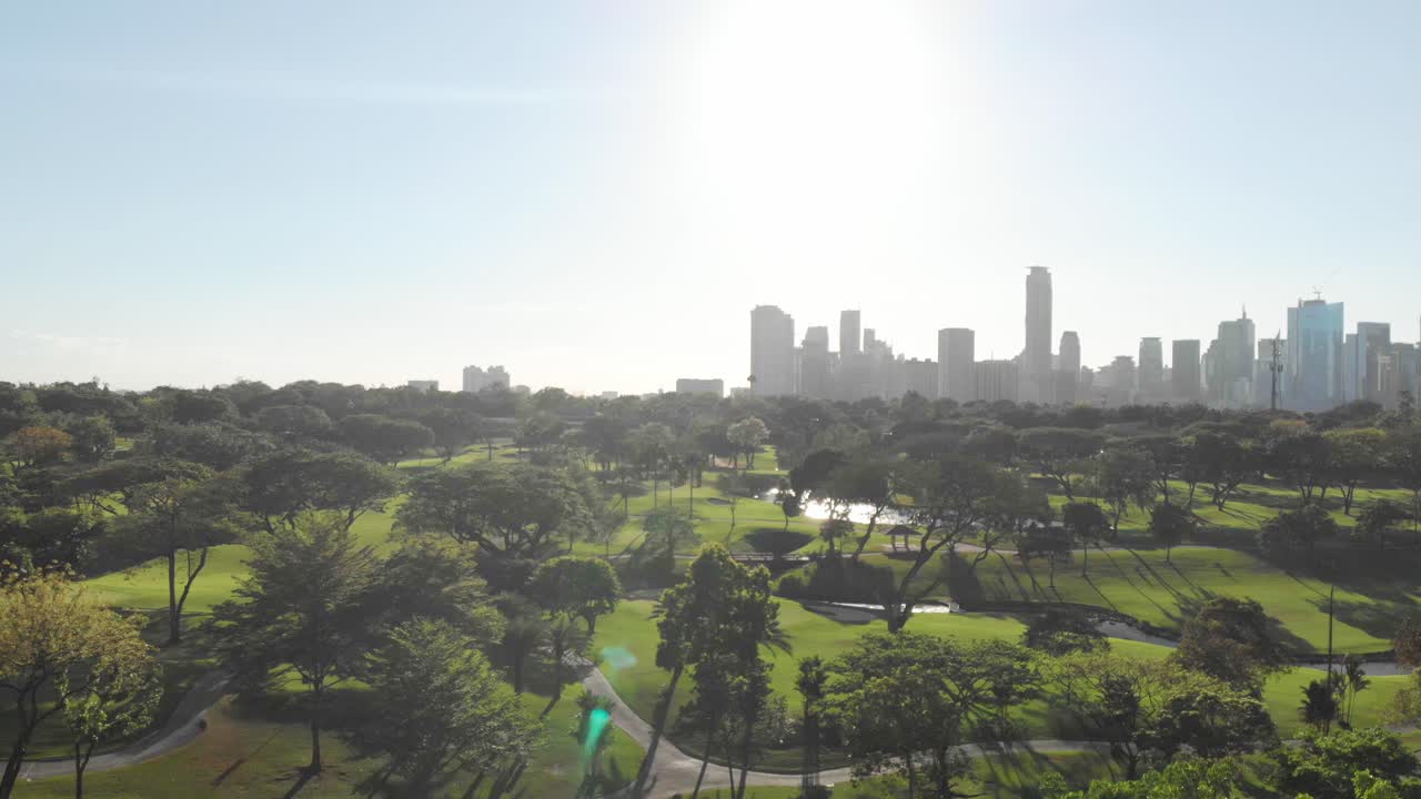 Rising Sun. Manila Golf and Country Club, BGC. View from BGC to Makati. Philippines