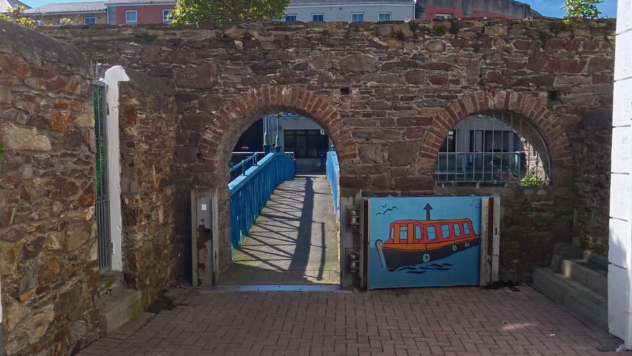 entrance to footbridge trough ancient walls Waterford City Ireland epic locations