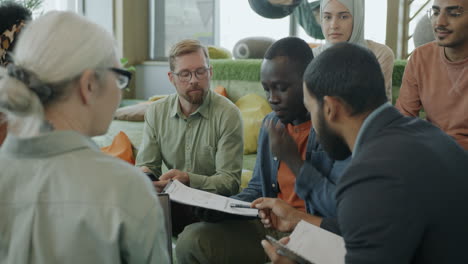diverse group meeting in modern office