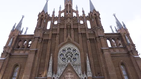 facade of a gothic revival brick church