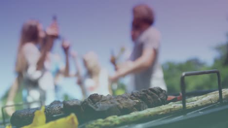 Animation-of-happy-caucasian-group-of-friends-dancing-and-having-bbq