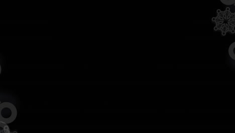 animación digital del patrón de copos de nieve sobre partículas azules contra un fondo negro