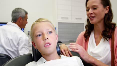 mother and son at dental clinic