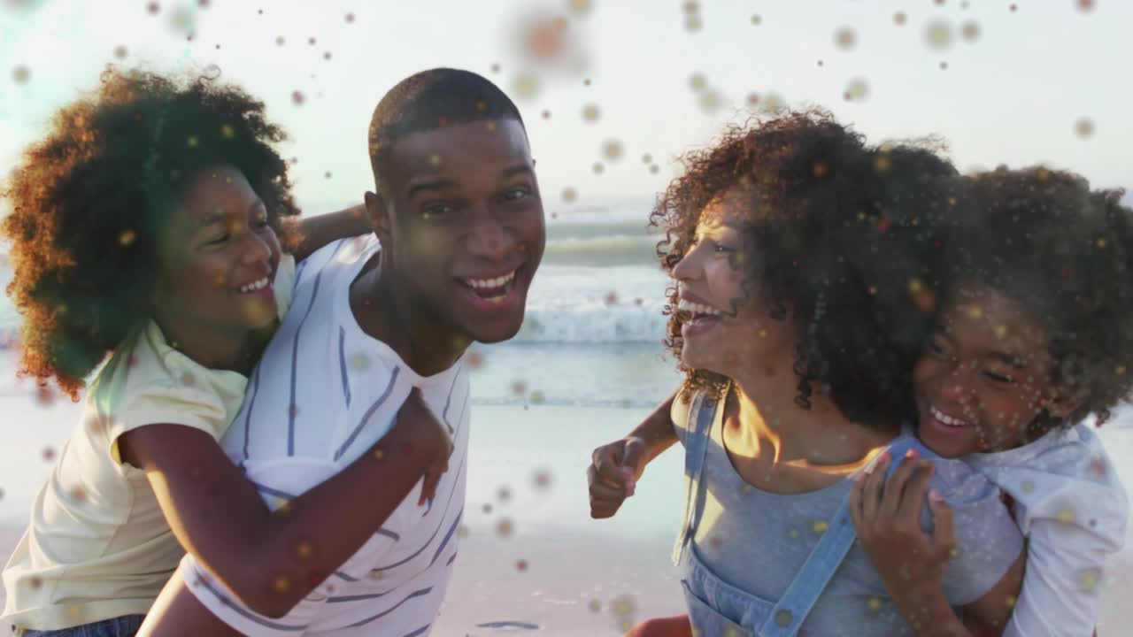 Famille sur la plage, étincelles flottantes, liens resserrés, publicité de voyage