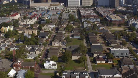 aerial view of houston, texas: residential neighborhoods and city skyline