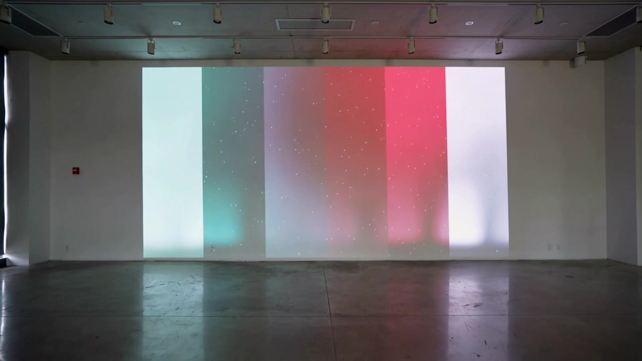 Animation starting color projection shifting for art, revealing red center with floor reflections