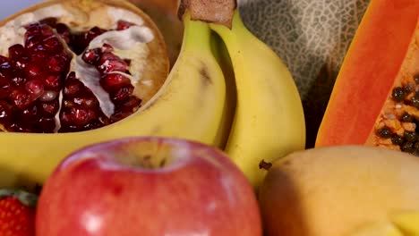 vibrant display of various sliced and whole fruits