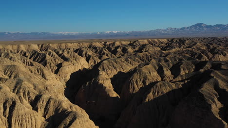 Wide-rotating-drone-shot-of-the-out-lands-of-Charyn-Canyon,-Kazakhstan