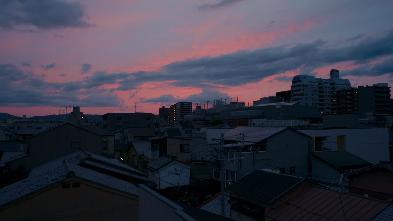 Clouds Above Kyoto Homes
A wide, peaceful view of a quiet Kyoto neighborhood at sunset.