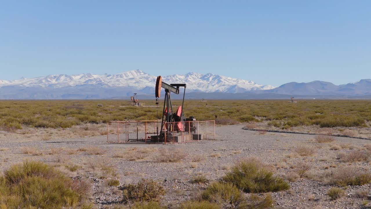 Oil pump operating in Patagonian plains, Resource exploitation and development, Argentina