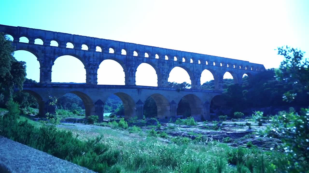 pont du gard behind a stone wall over the river building of the r&ouml;hmer zurr progressive water pumping