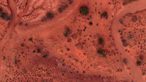 Drone-flying-looking-strait-down-at-the-martian-looking-terrain-of-Monument-Valley