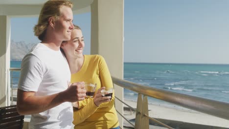 Caucasian-couple-enjoying-their-time-seaside