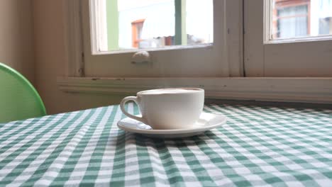 warm coffee at a cozy window seat