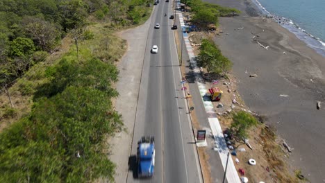 aerial drone view of the highway along port caldera, puntarenas, costa rica