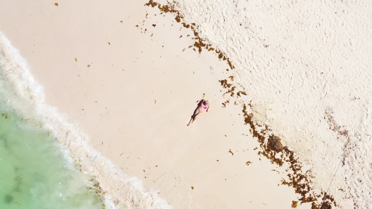 Aerial View of People Relaxing on a Tropical Beach