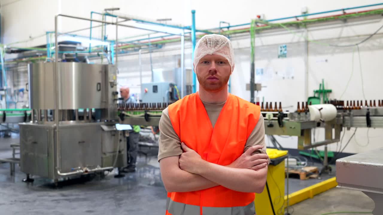 Factory worker in bottling plant