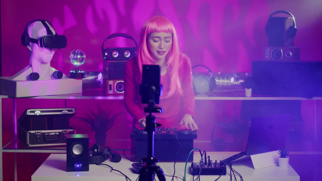 DJ Woman with Pink Wig Vlogging in Studio