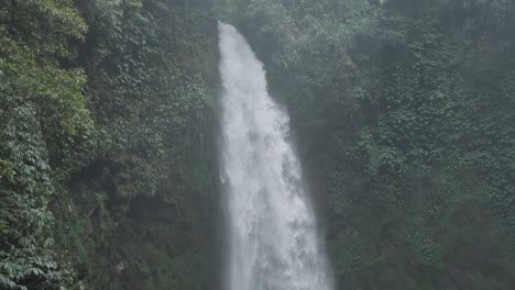 majestic waterfall in lush tropical forest