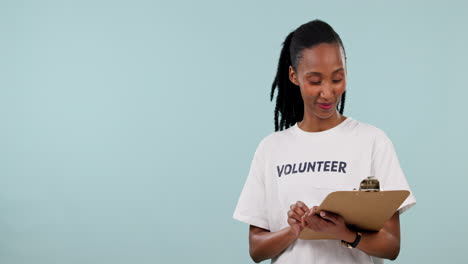 Volunteer,-black-woman-and-smile-with-pointing-to