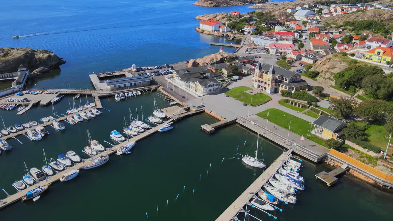 Drone Flying Over Boats Moored At Lysekil Marina In Vastra Gotaland County, Sweden. - aerial