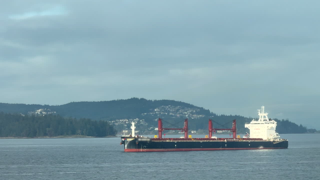 Cargo vessel anchored peacefully off Vancouver Island.