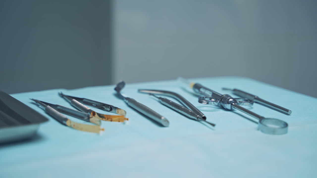 Metallic dentist tools close up. Dentist office with tools for teeth care