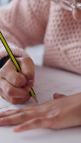 young girl doing homework or taking a test