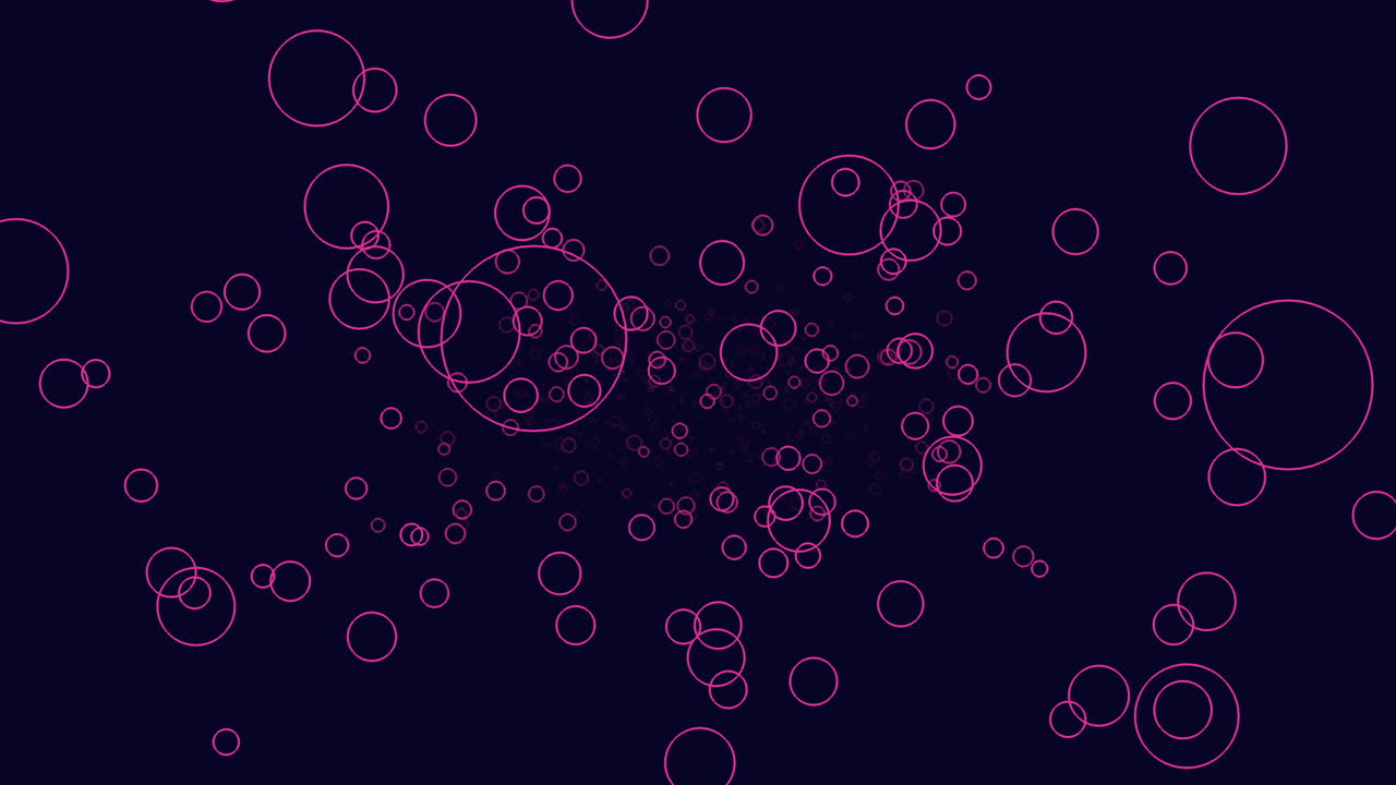 Dark background comes alive with bright pink bubbles dancing freely