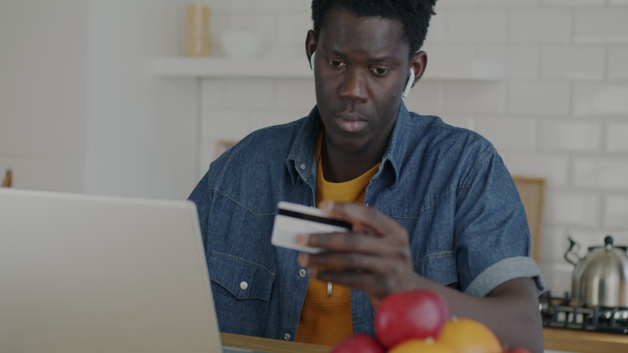 Man Shopping Online with Credit Card