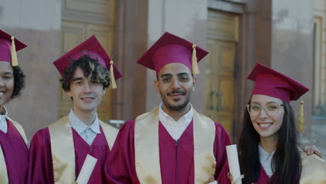 group of diverse graduates at commencement