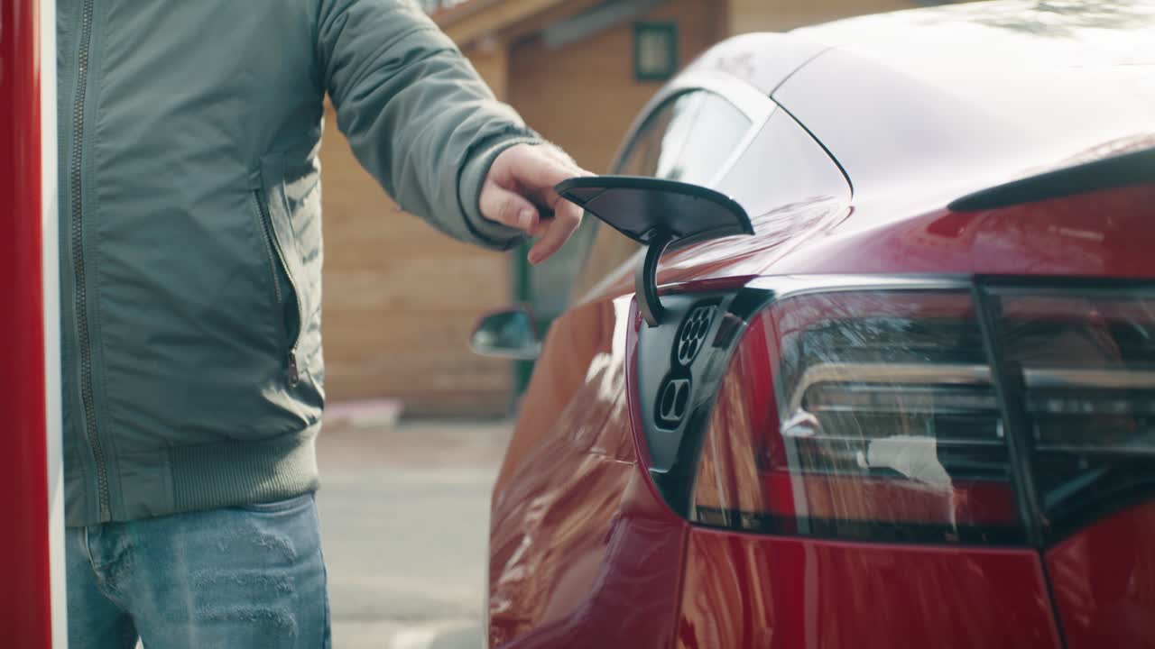 The open charging port flap of the vehicle is closed
