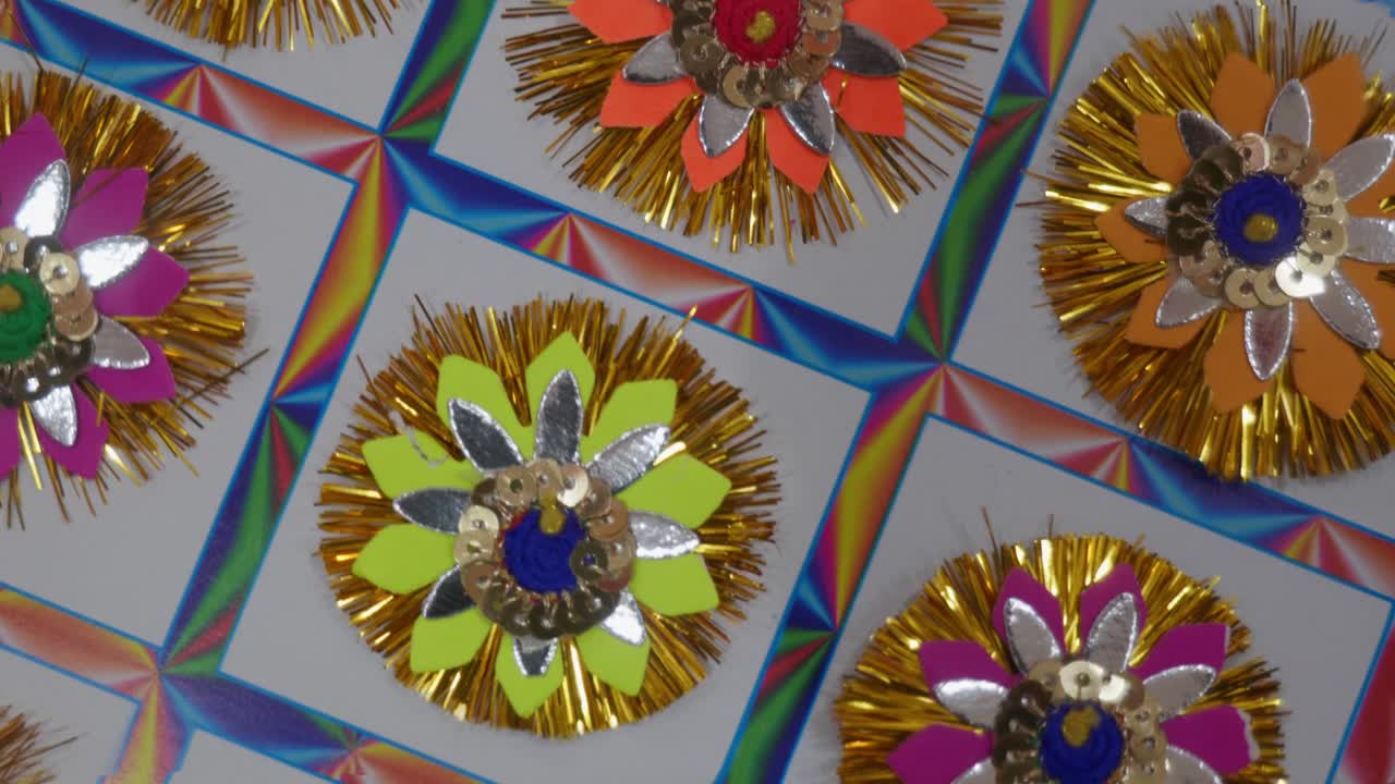 very affordable and colorful rakhis with shimmering gold tinsel, colorful papers,for Raksha Bandhan Festival in India , 4k, closeup, 25p
