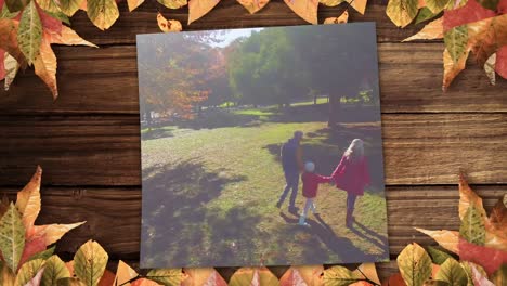 familia caminando en el parque y hoja de arce en la mesa 4k