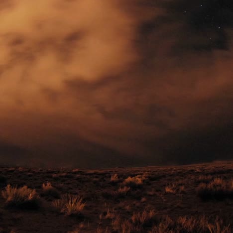 Time-lapse-of-storm-clouds-and-star-trails-over-Homolovi-Ruins-State-Park-near-Winslow-Arizona