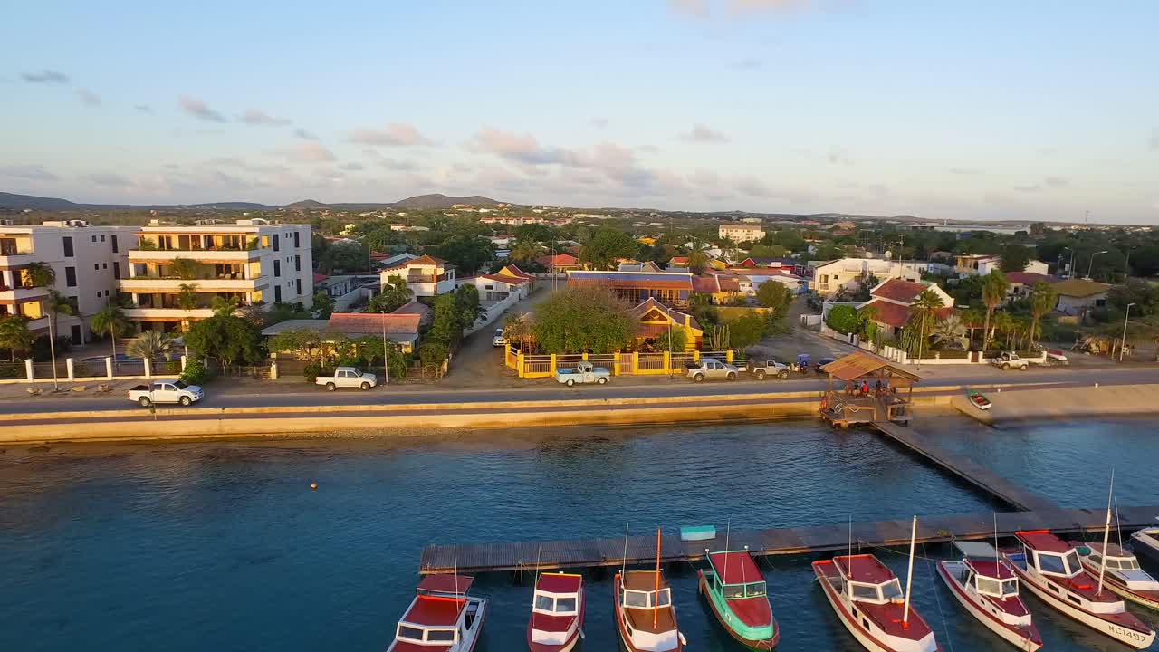 Aerial view of a town with boats docked at the pier